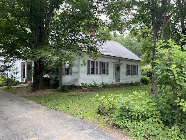 67 Elm St, Newfield, ME 04095 - view of front of house with a metal roof