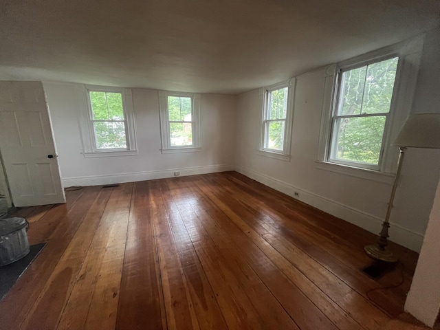 67 Elm St, Newfield, ME 04095 - unfurnished room featuring hardwood / wood-style floors and plenty of natural light