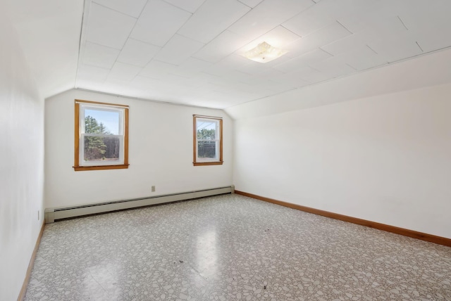 195 River Rd, Avon, ME 04966 - additional living space with a baseboard radiator, lofted ceiling, and baseboards