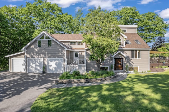 56 Old Kings Hwy, Ogunquit, ME 03907 - view of front of home featuring a shingled roof, aphalt driveway, and a front yard
