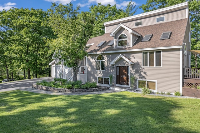 56 Old Kings Hwy, Ogunquit, ME 03907 - view of front of house with roof with shingles, driveway, and a front lawn
