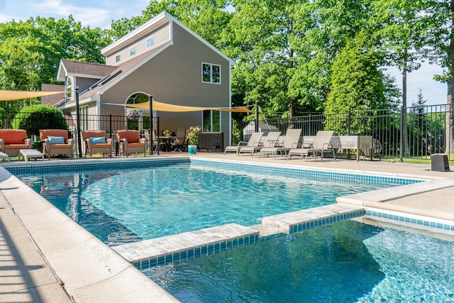 56 Old Kings Hwy, Ogunquit, ME 03907 - view of swimming pool with a patio area, fence, and a pool with connected hot tub