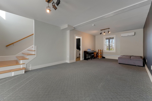 56 Old Kings Hwy, Ogunquit, ME 03907 - carpeted living room with rail lighting, stairway, baseboards, and a wall unit AC