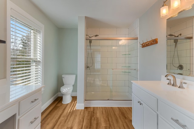 56 Old Kings Hwy, Ogunquit, ME 03907 - bathroom with tiled shower, toilet, and wood finished floors