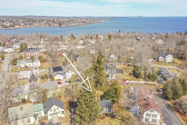 aerial view featuring a residential view and a water view
