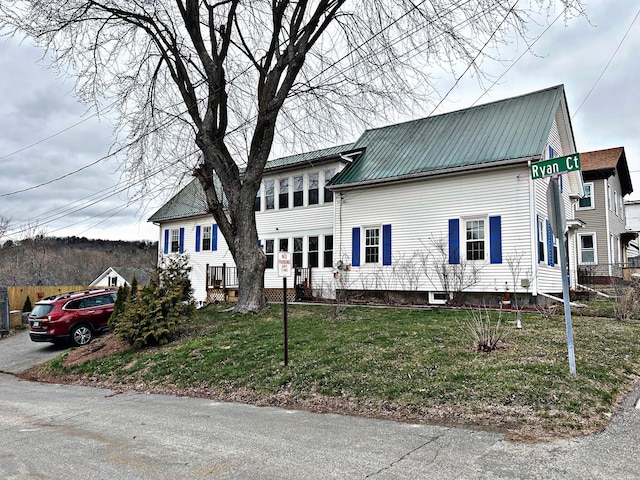 106 Northern Ave, Augusta, ME 04330 - view of front facade featuring a front yard and metal roof