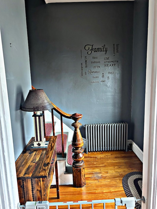 106 Northern Ave, Augusta, ME 04330 - interior space featuring radiator heating unit, baseboards, and wood finished floors