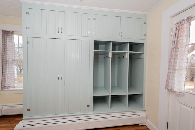 369 Ohio St, Bangor, ME 04401 - mudroom with ornamental molding, baseboard heating, and wood finished floors