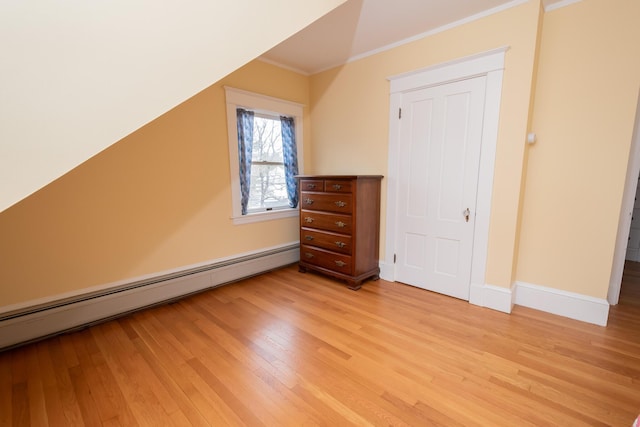 369 Ohio St, Bangor, ME 04401 - bonus room with baseboard heating, light wood-style floors, and baseboards