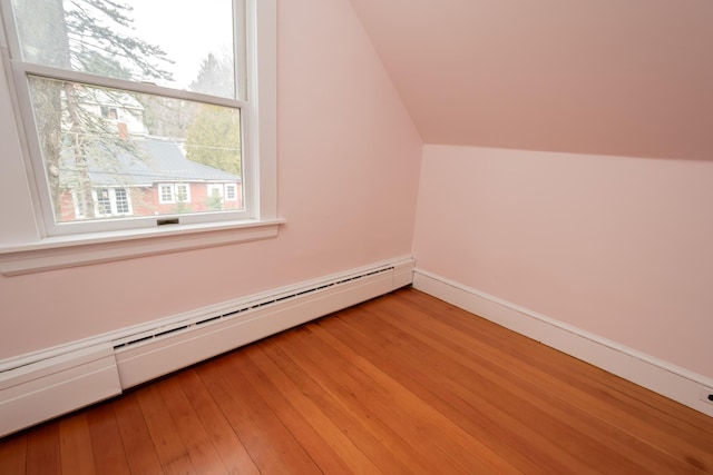 369 Ohio St, Bangor, ME 04401 - bonus room featuring baseboard heating and light wood finished floors