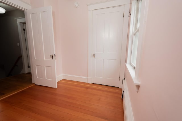 369 Ohio St, Bangor, ME 04401 - unfurnished bedroom featuring light wood-style floors and baseboards