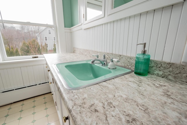 369 Ohio St, Bangor, ME 04401 - bathroom with a baseboard radiator and vanity