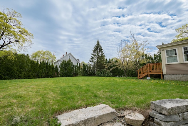 369 Ohio St, Bangor, ME 04401 - view of green lawn with stairs and a wooden deck