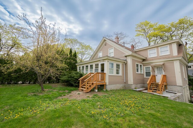 369 Ohio St, Bangor, ME 04401 - rear view of house featuring a chimney and a lawn