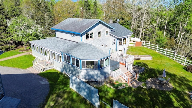 birds eye view of property with a forest view