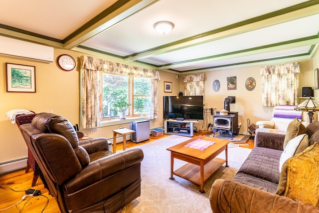 living area featuring a wood stove, baseboard heating, a wall unit AC, and wood finished floors
