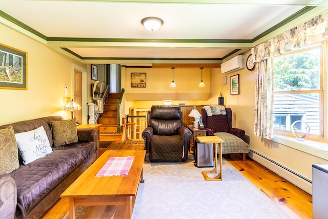 living room with ornamental molding, a baseboard radiator, plenty of natural light, and a wall unit AC