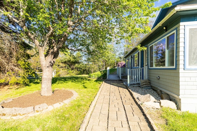 view of yard with a deck