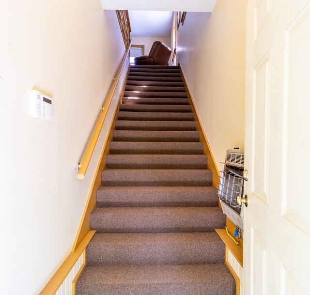 stairway with carpet flooring