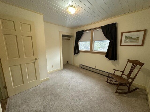 unfurnished room with carpet flooring and baseboards