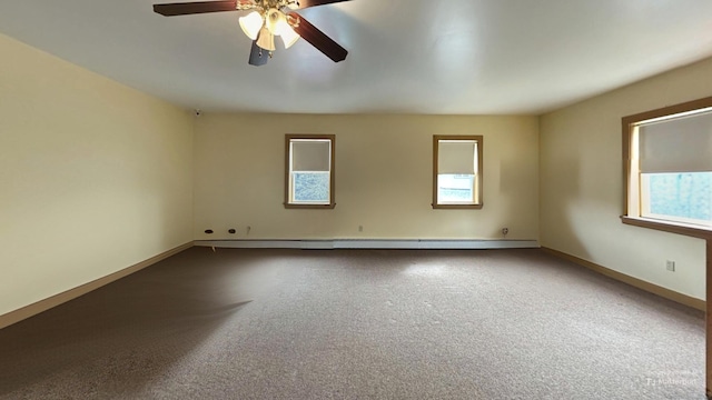unfurnished room with plenty of natural light, carpet floors, and a ceiling fan