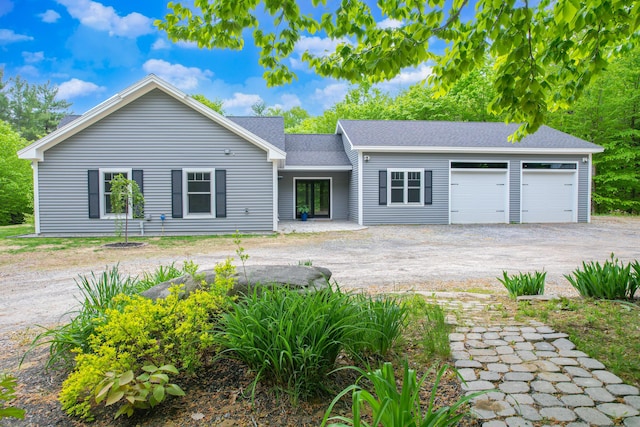 12 Charlies Way, Readfield, ME 04355 - view of front facade with roof with shingles, an attached garage, and driveway