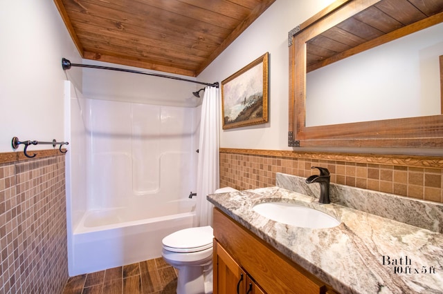 12 Charlies Way, Readfield, ME 04355 - bathroom featuring wainscoting, toilet, shower / bath combination with curtain, tile walls, and wood ceiling