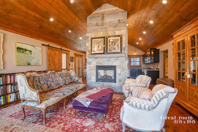 12 Charlies Way, Readfield, ME 04355 - living area featuring recessed lighting, a stone fireplace, vaulted ceiling, and wooden ceiling
