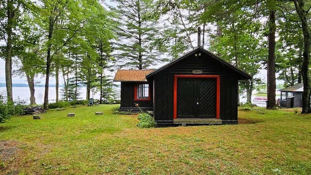 view of outdoor structure featuring an outdoor structure and a water view