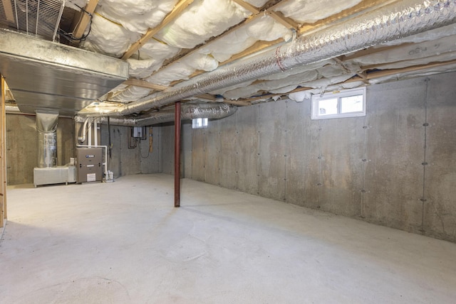 basement featuring heating unit