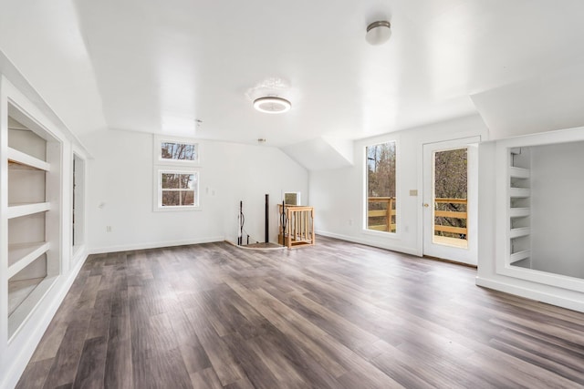 285 Hockomock Rd, Woolwich, ME 04579 - bonus room with built in shelves, wood finished floors, and baseboards