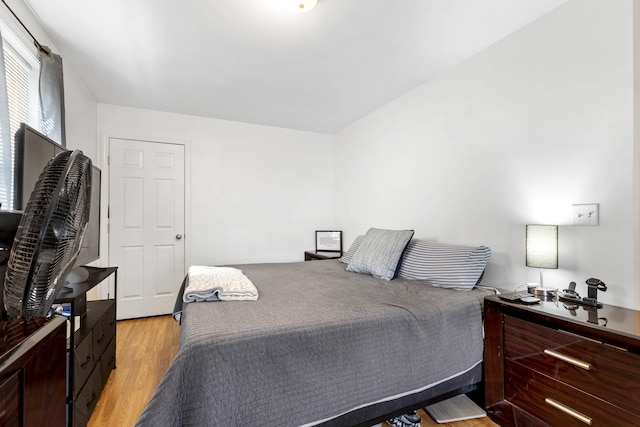 bedroom featuring light wood finished floors