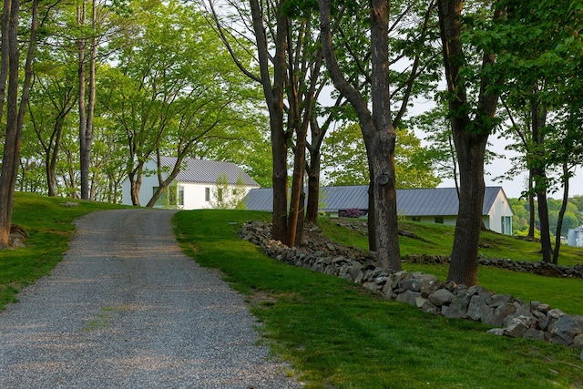 4 Ice House Pt, York, ME 03909 - ranch-style house with driveway, a front yard, and metal roof