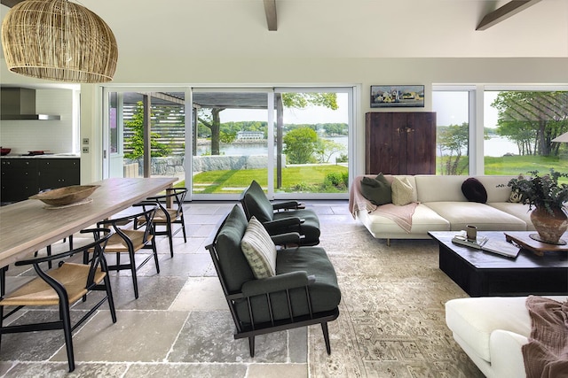 4 Ice House Pt, York, ME 03909 - living room with stone tile flooring, healthy amount of natural light, and a water view