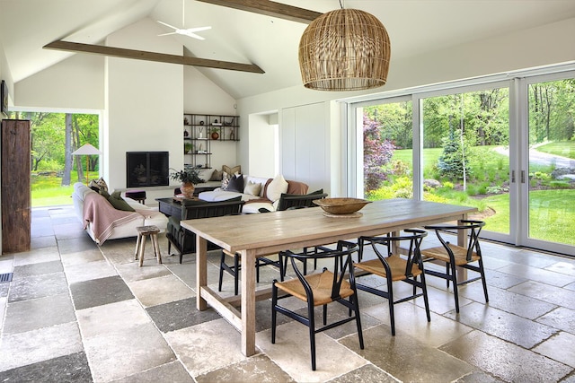 4 Ice House Pt, York, ME 03909 - dining space featuring stone tile floors, high vaulted ceiling, beamed ceiling, and ceiling fan