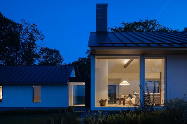 4 Ice House Pt, York, ME 03909 - back of property featuring a standing seam roof, metal roof, and a chimney