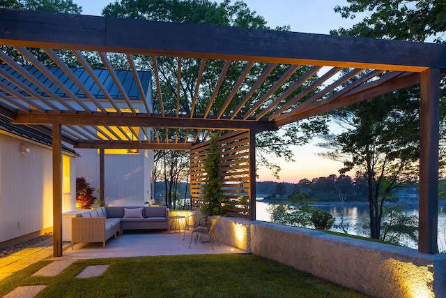 4 Ice House Pt, York, ME 03909 - patio terrace at dusk featuring a water view and outdoor lounge area