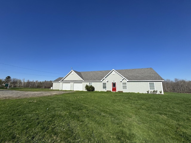 8 Bean Ln, Detroit, ME 04929 - ranch-style house featuring dirt driveway, a front yard, and a garage