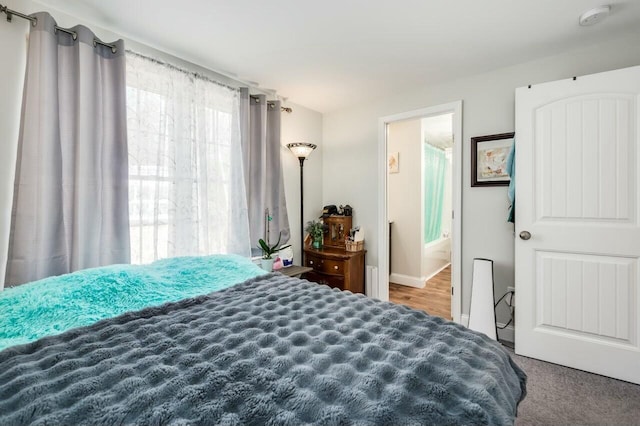 80 Dixon Rd, Lebanon, ME 04027 - bedroom featuring ensuite bathroom and baseboards