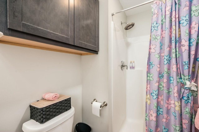 80 Dixon Rd, Lebanon, ME 04027 - full bathroom featuring toilet and a shower with shower curtain
