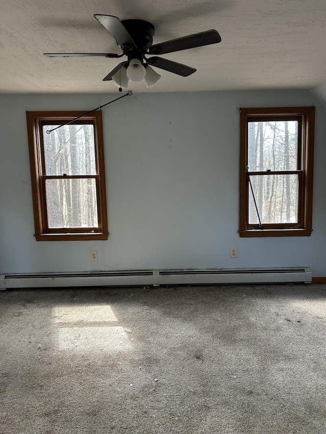 669 New Dam Rd, Waterboro, ME 04061 - carpeted empty room featuring ceiling fan and baseboard heating