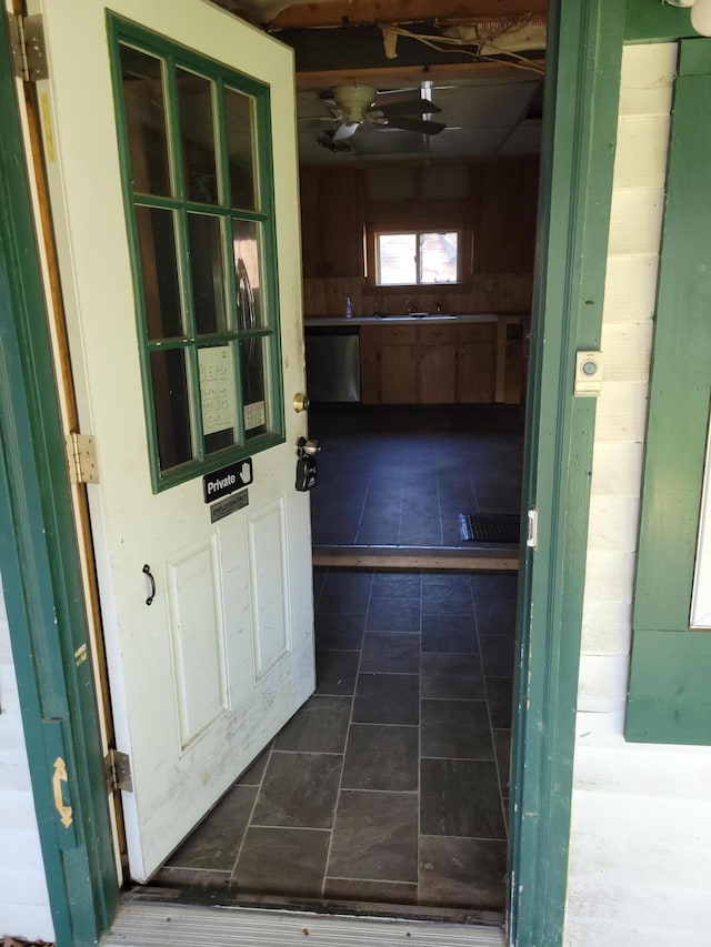 doorway to property featuring a sink