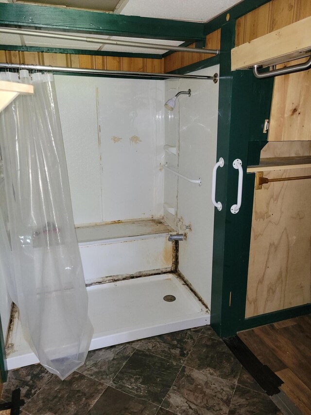 bathroom with a stall shower