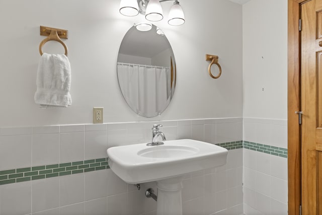 86 Firth Dr, Boothbay, ME 04537 - bathroom featuring tile walls and a wainscoted wall