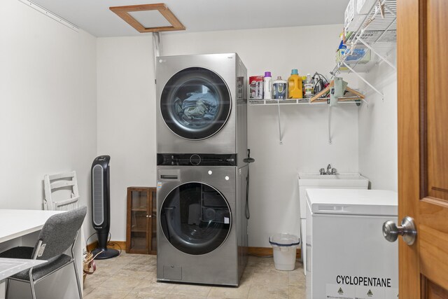 86 Firth Dr, Boothbay, ME 04537 - laundry area featuring stacked washer / dryer and attic access