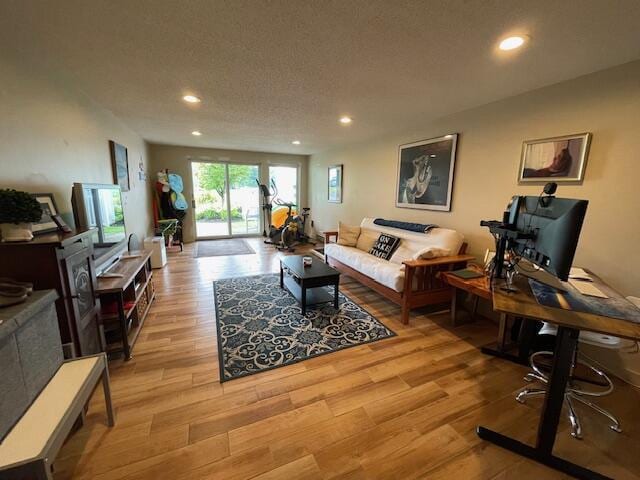 24 Clifford Rd Unit 18, Naples, ME 04055 - living area with light wood-type flooring and recessed lighting
