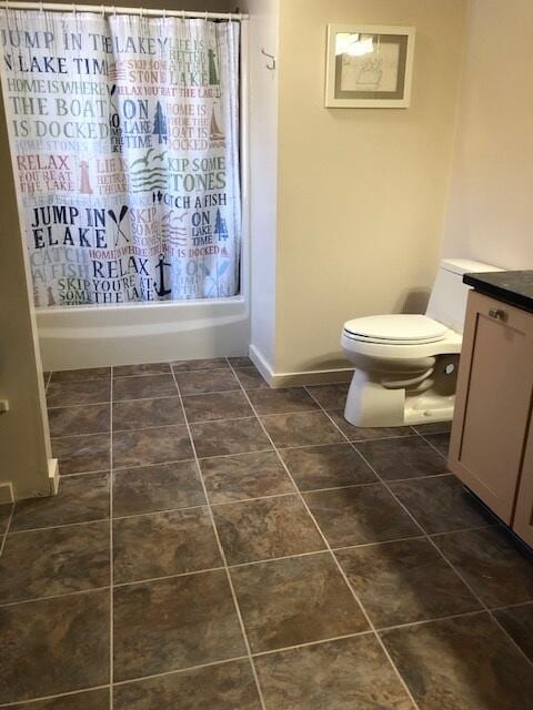 24 Clifford Rd Unit 18, Naples, ME 04055 - full bath with shower / bath combo with shower curtain, tile patterned flooring, toilet, and vanity