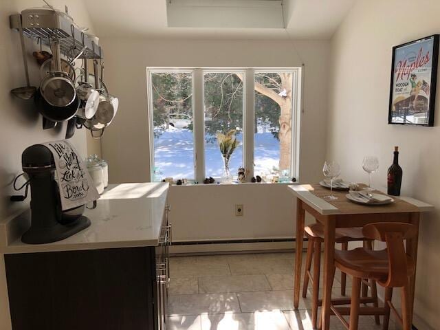24 Clifford Rd Unit 18, Naples, ME 04055 - dining space with a baseboard radiator