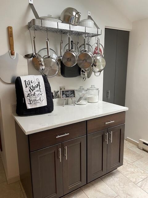 24 Clifford Rd Unit 18, Naples, ME 04055 - bar featuring light tile patterned floors and baseboards