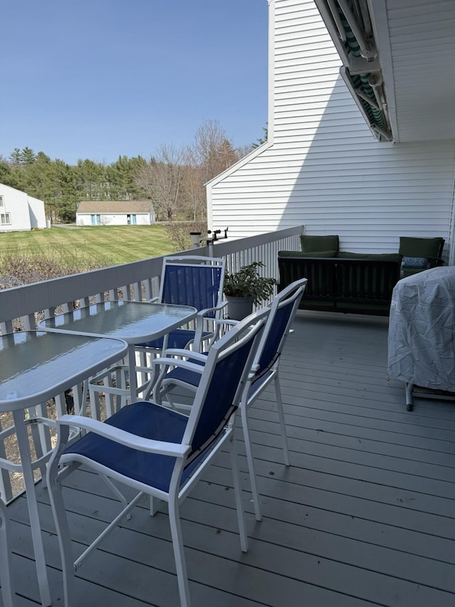 24 Clifford Rd Unit 18, Naples, ME 04055 - deck with outdoor dining area